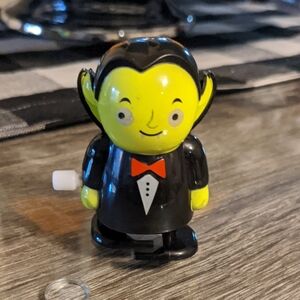 RARE Vintage Dracula Vampire Wind Up Toy WORKS Tuxedo Fangs Green Face